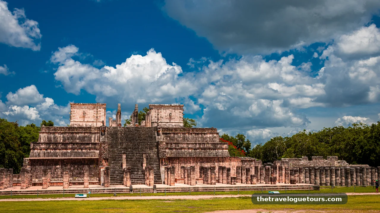 El Castillo pyramid at Chichen Itza, Yucatan, under a bright blue sky