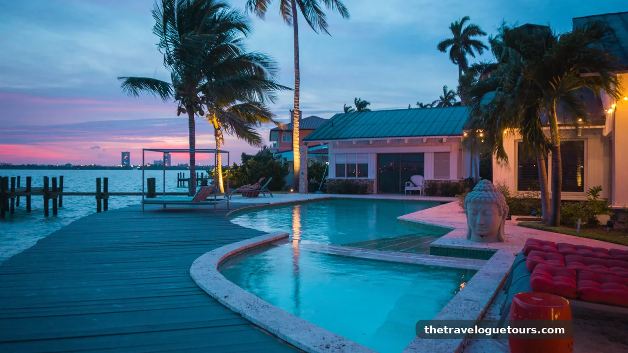 Resort pool surrounded by palm trees in Florida at sunset