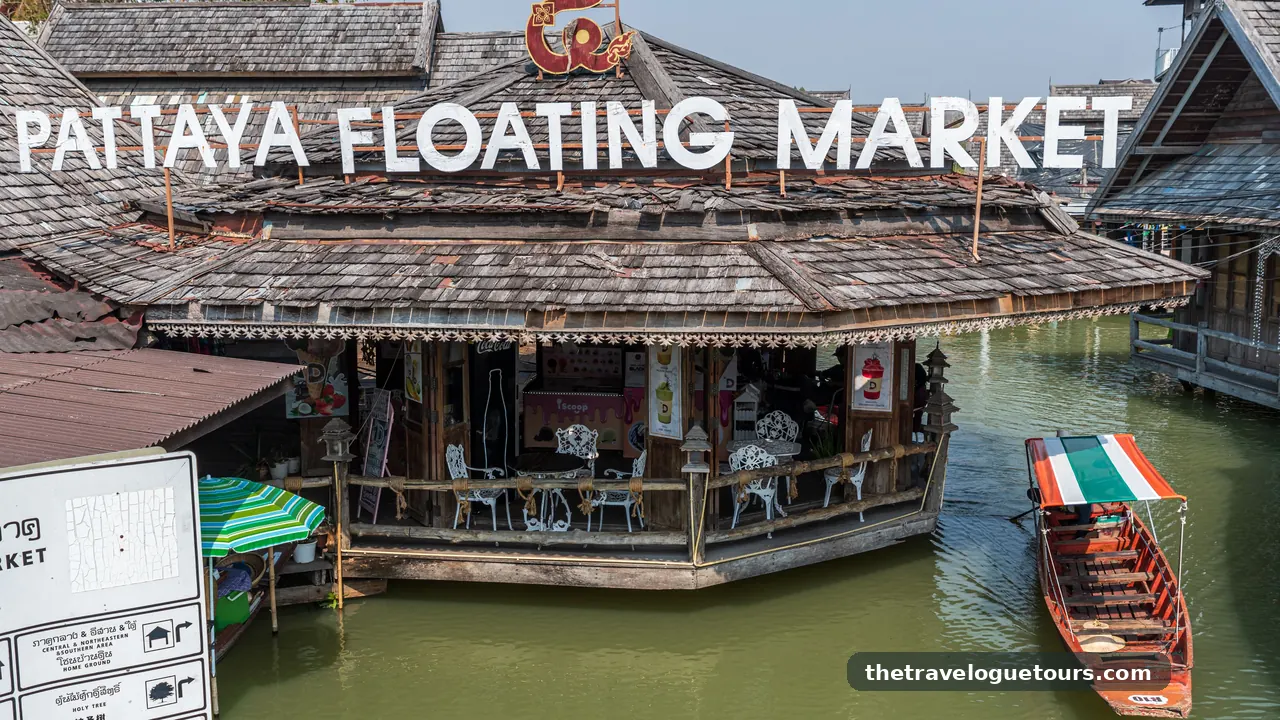 Colorful wooden boats and traditional Thai architecture at the Pattaya floating market in Thailand