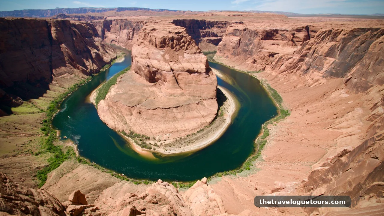 A breathtaking aerial view of the iconic Horseshoe Bend in Arizona, showcasing its dramatic rock formations and meandering river