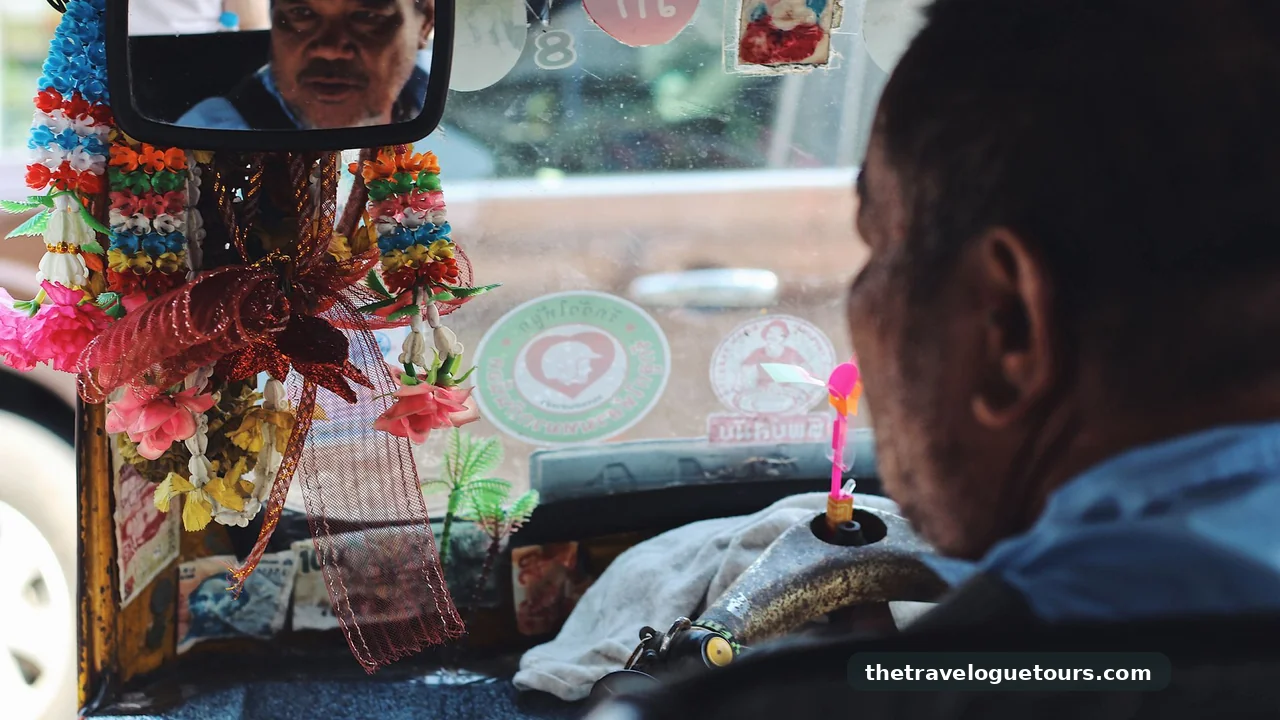 Colorful decorated tuk tuk interior on a Bangkok street in Thailand