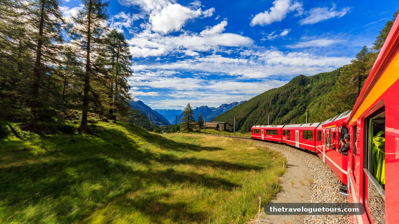 Red Bernina Express train curving through green alpine valleys in Switzerland
